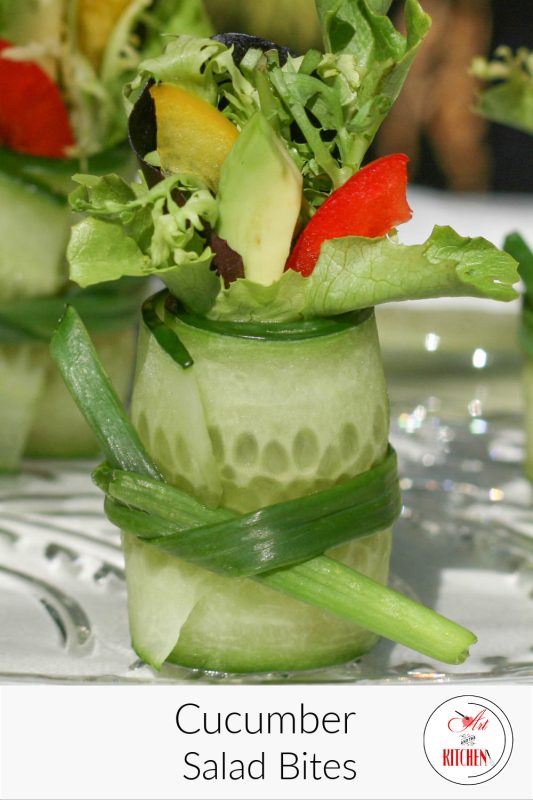 Thin sliced cucumber rolled, tied with green onion and stuffed with salad greens and avocado.