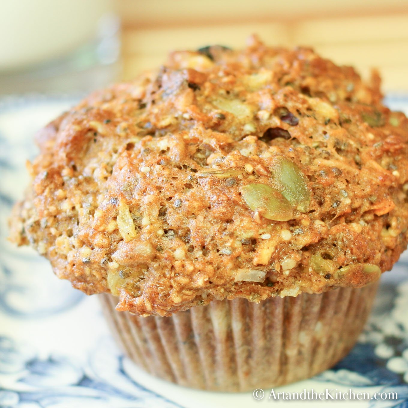 Healthy muffin  with seeds and fruit on blue plate