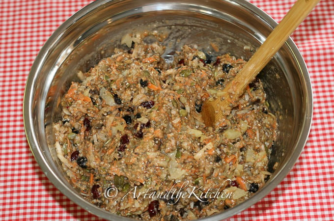 Stainless steel bowl filled with batter for healthy muffins.