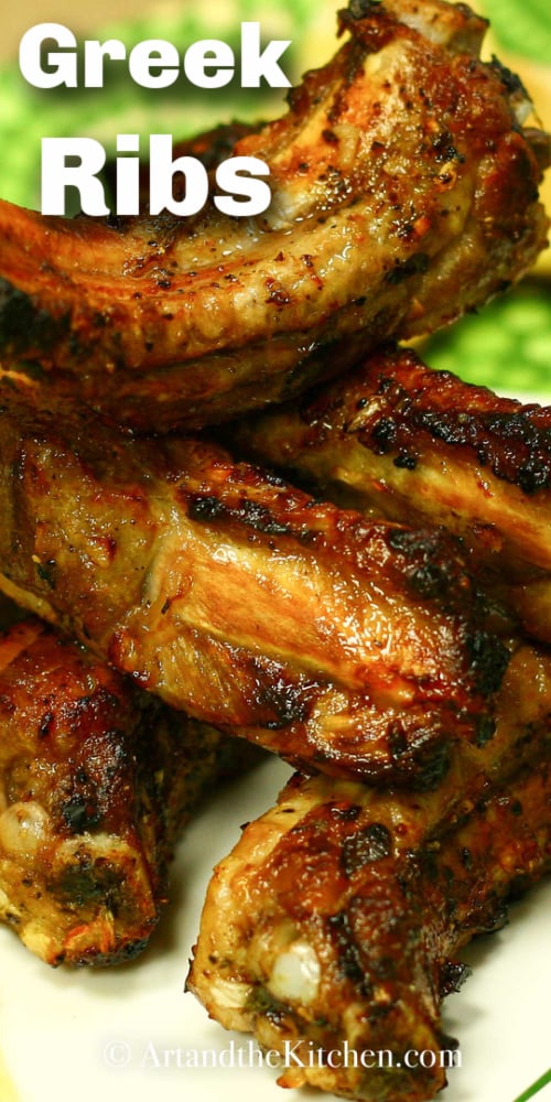 A finger licking recipe for Greek Ribs! Marinated in fresh garlic, oregano and lemon. Great for dinner or a very tasty appetizer. via @artandthekitch