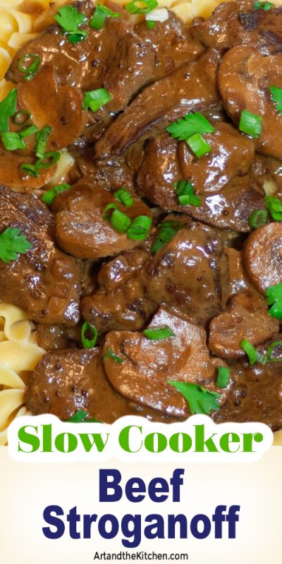 Plate of beef stroganoff on broad noodles.