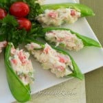 Plate of snow peas stuffed with crab filling.