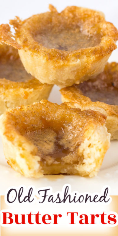 Stack of tarts with sweet runny filling and golden brown flaky crust on a white plate