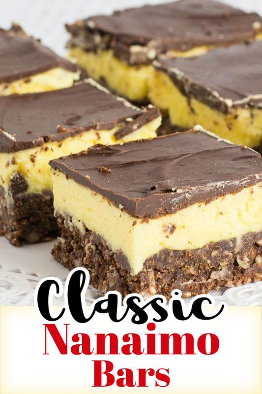 Rows of cut up squares that have layers of chocolate, yellow custard and chocolate coconut crust.