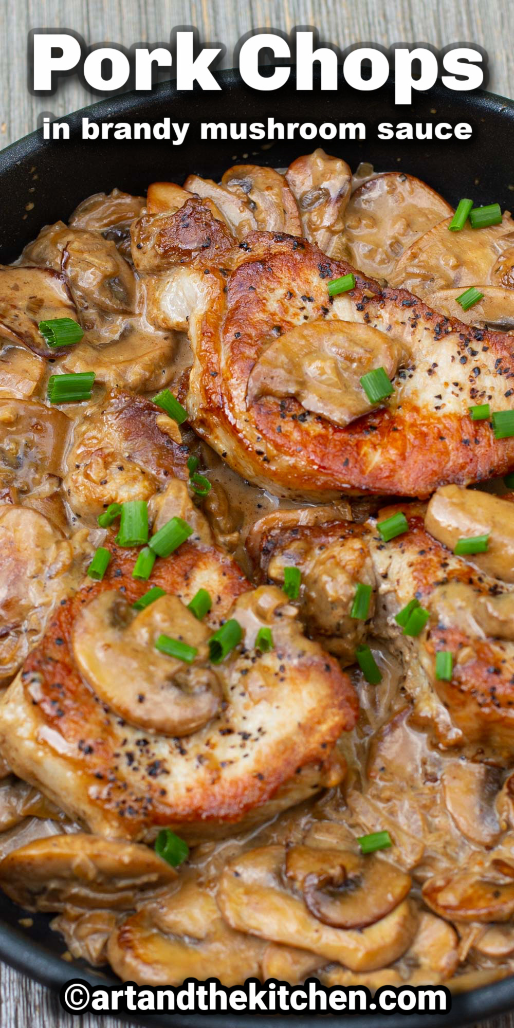 Tender, juicy Pork Chops in a Creamy Brandy Mushroom Sauce is an easy recipe that delivers gourmet flavor. A great one-pan dish. via @artandthekitch
