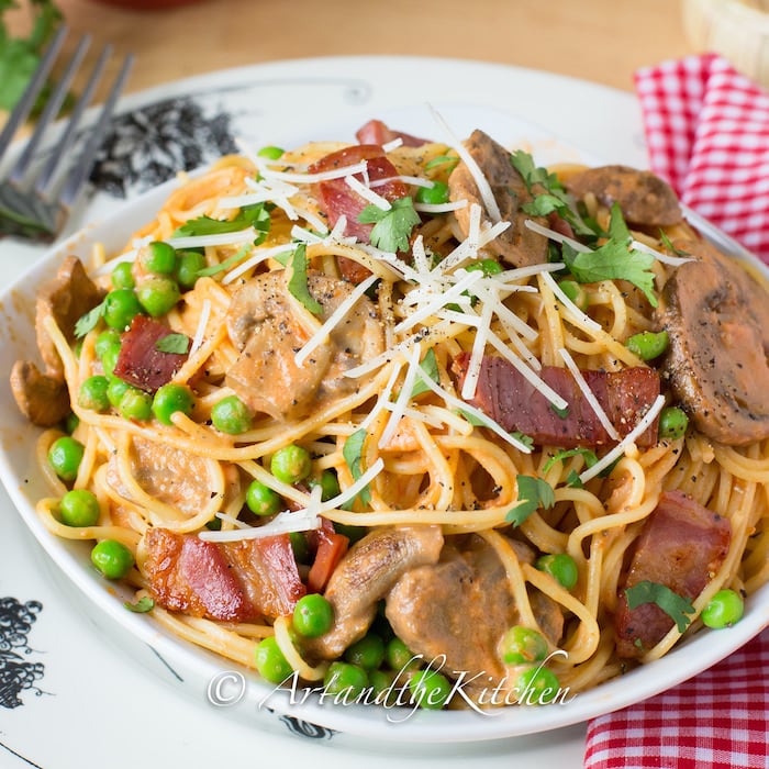Capellini D'Angelo Roma is a fantastic pasta recipe with angel hair pasta, peas and lean, thick cut bacon tossed in a creamy tomato sauce.