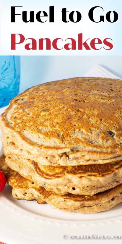 Stack of whole wheat pancakes on white plate