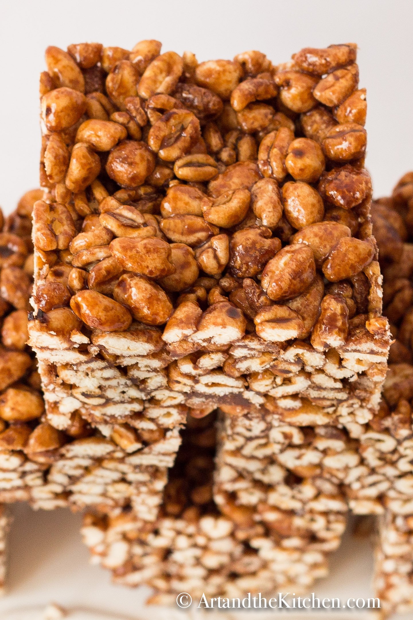 Puffed Wheat Squares are an easy to make treat. A great no bake square that is chewy and gooey. via @artandthekitch