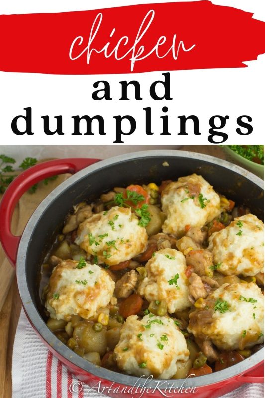 Roasting pan filled with chicken stew topped with fluffy dumplings.