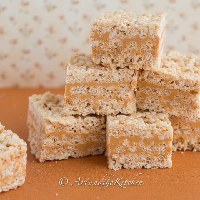Stack of rice krispie squares with a butterscotch center.