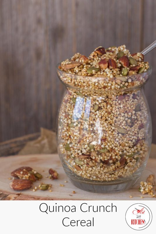 Glass jar filled with toasted quinoa, almonds, and pumpkin seed granola.