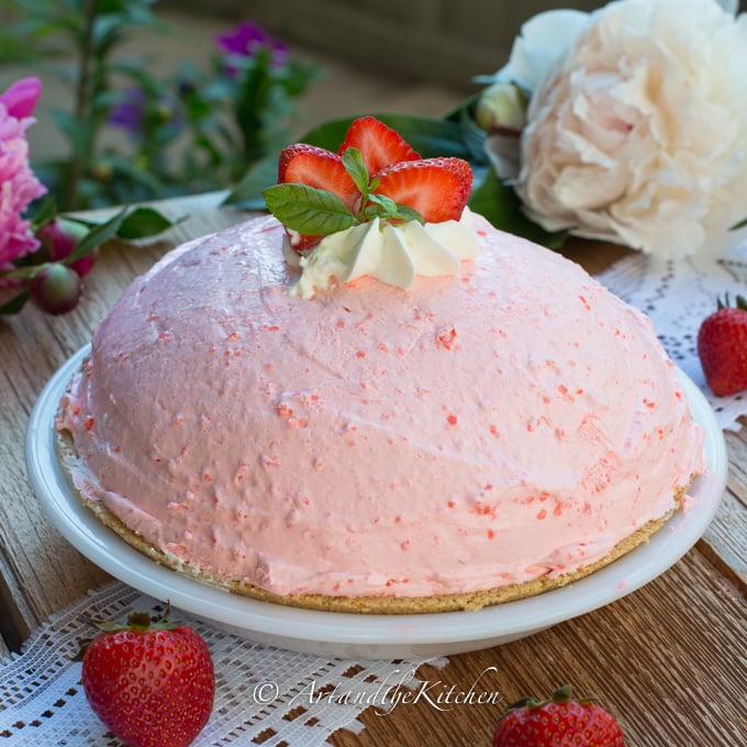 Whole no bake pie made with strawberries and cream cheese.