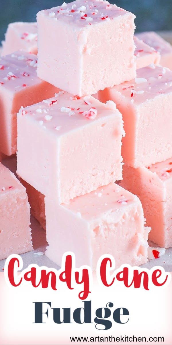 Stack of pink fudge made with ground up candy canes.