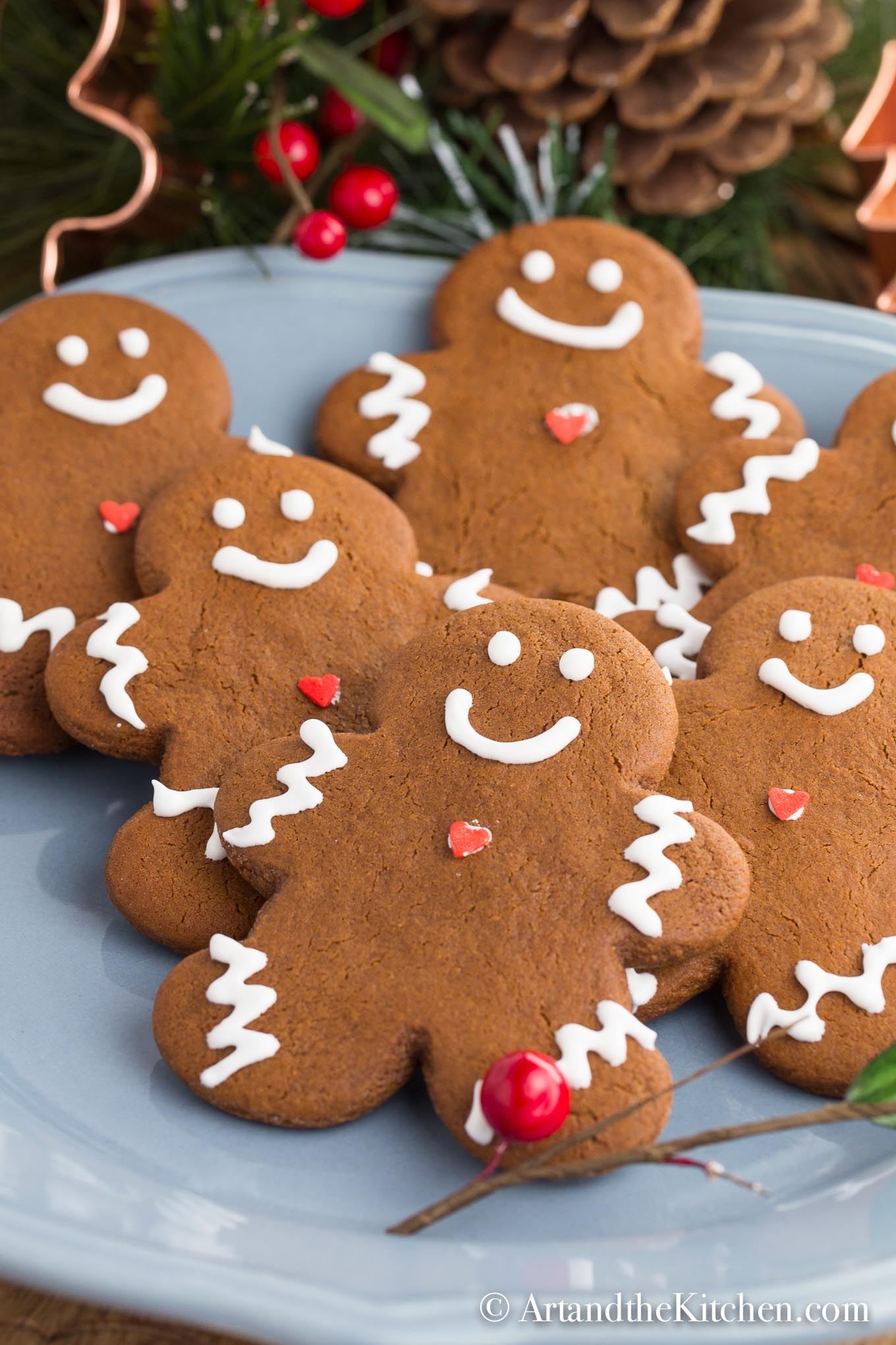 Plate of decorated gingerbread cookie men.