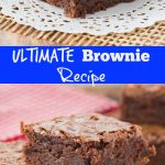 A stack of rich, fudgy brownies with a crackly top sits on a doily-covered plate.