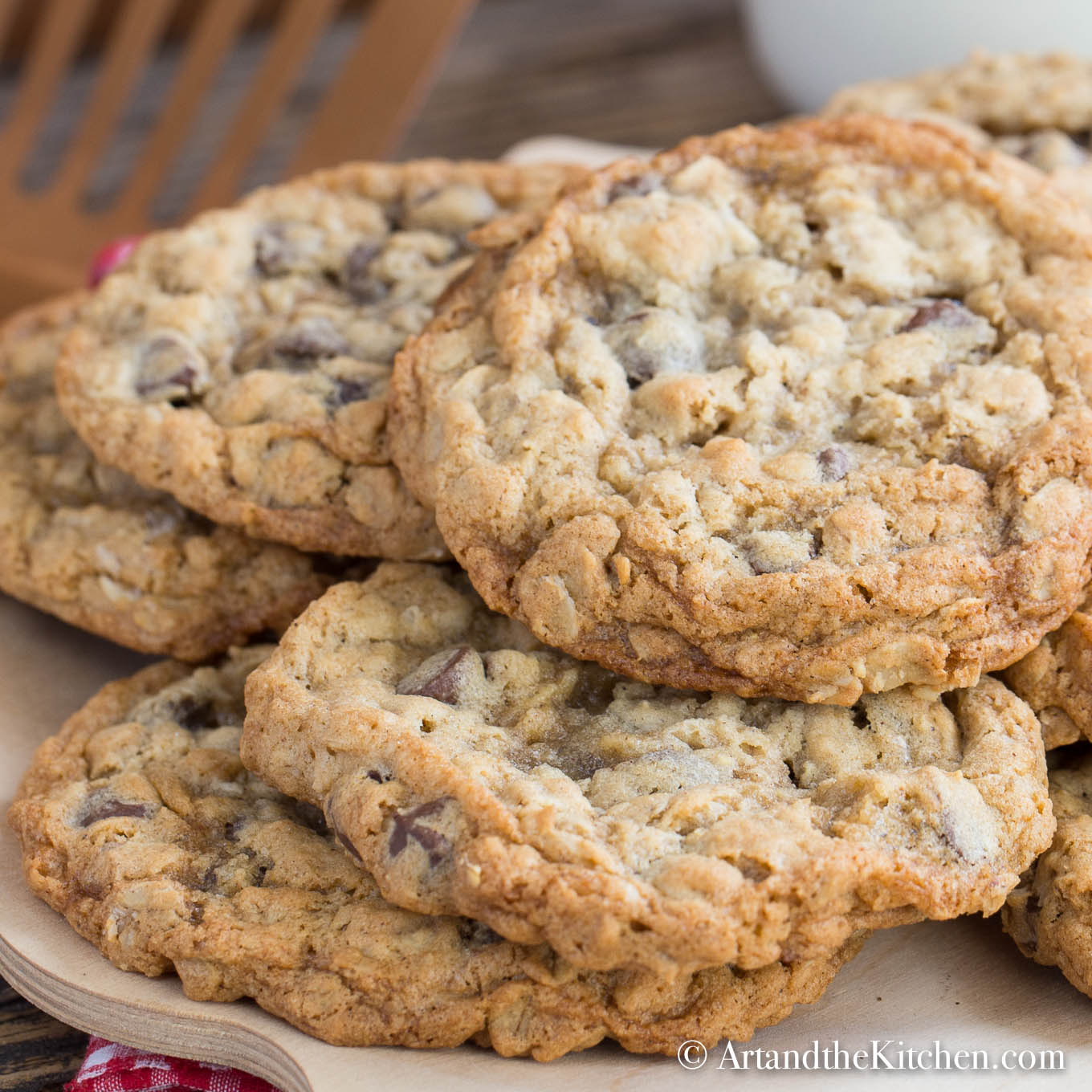 Wooden plate filled with homemade chocolate chip cookies