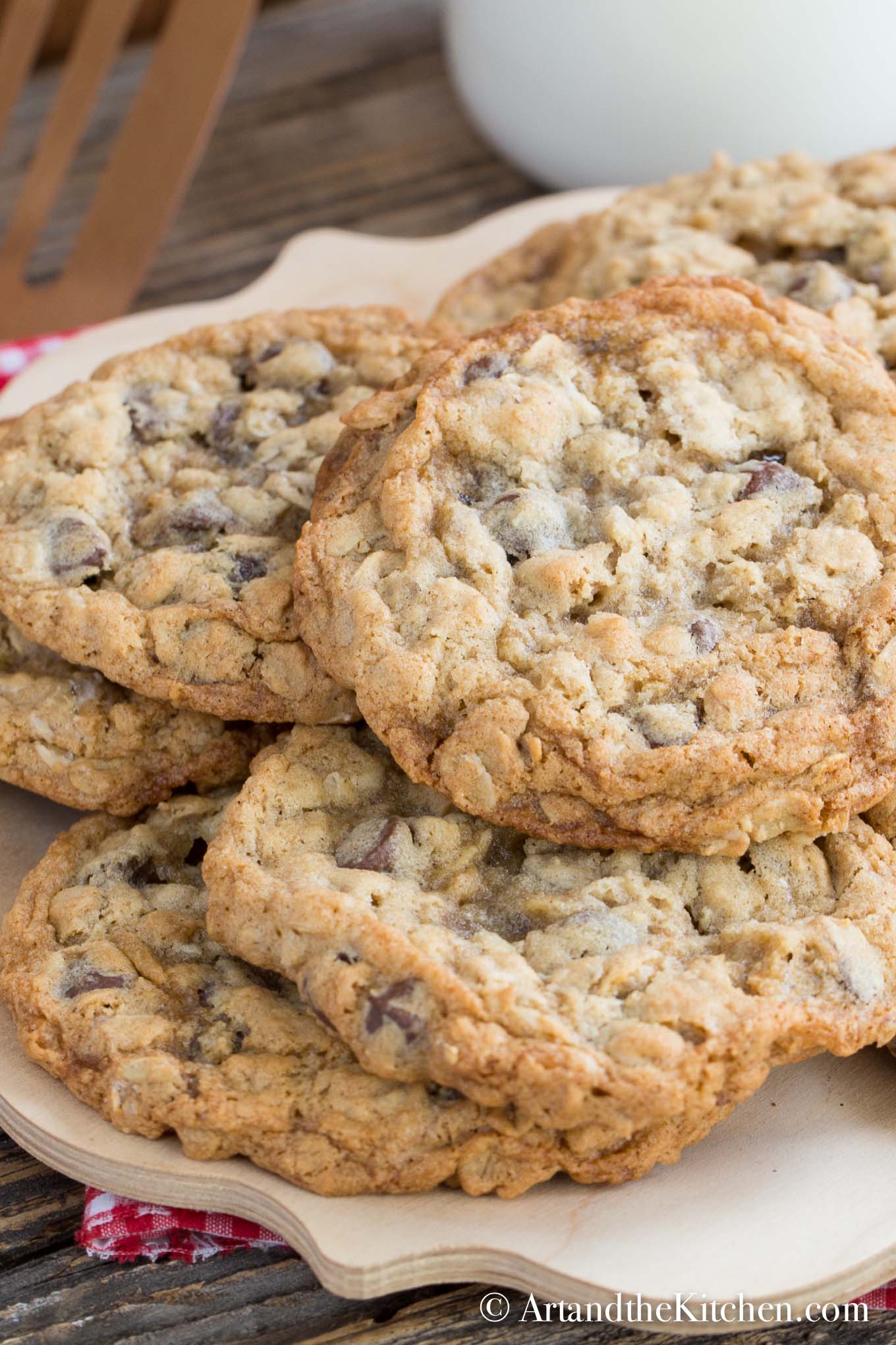 Wooden plate filled with homemade chocolate chip cookies