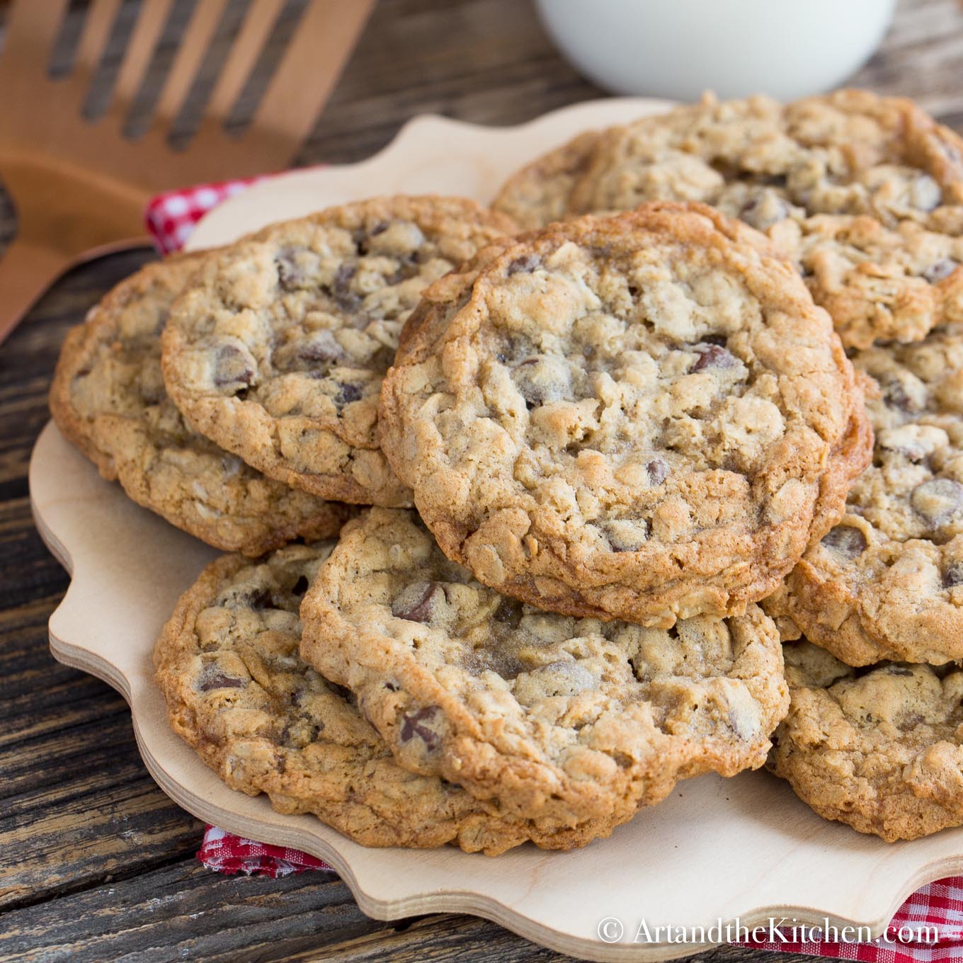 Wooden plate filled with homemade chocolate chip cookies