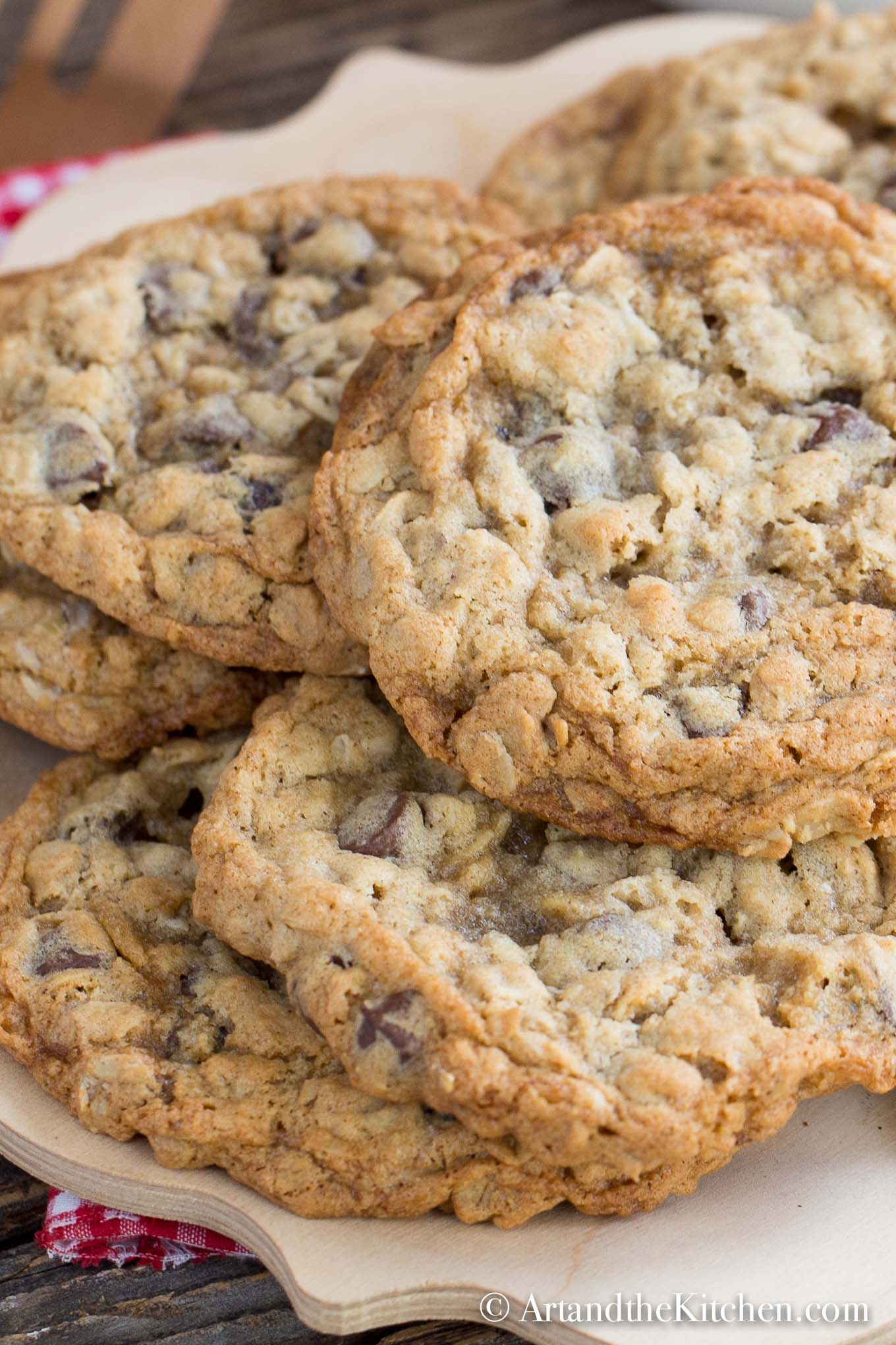 Wooden plate filled with homemade chocolate chip cookies