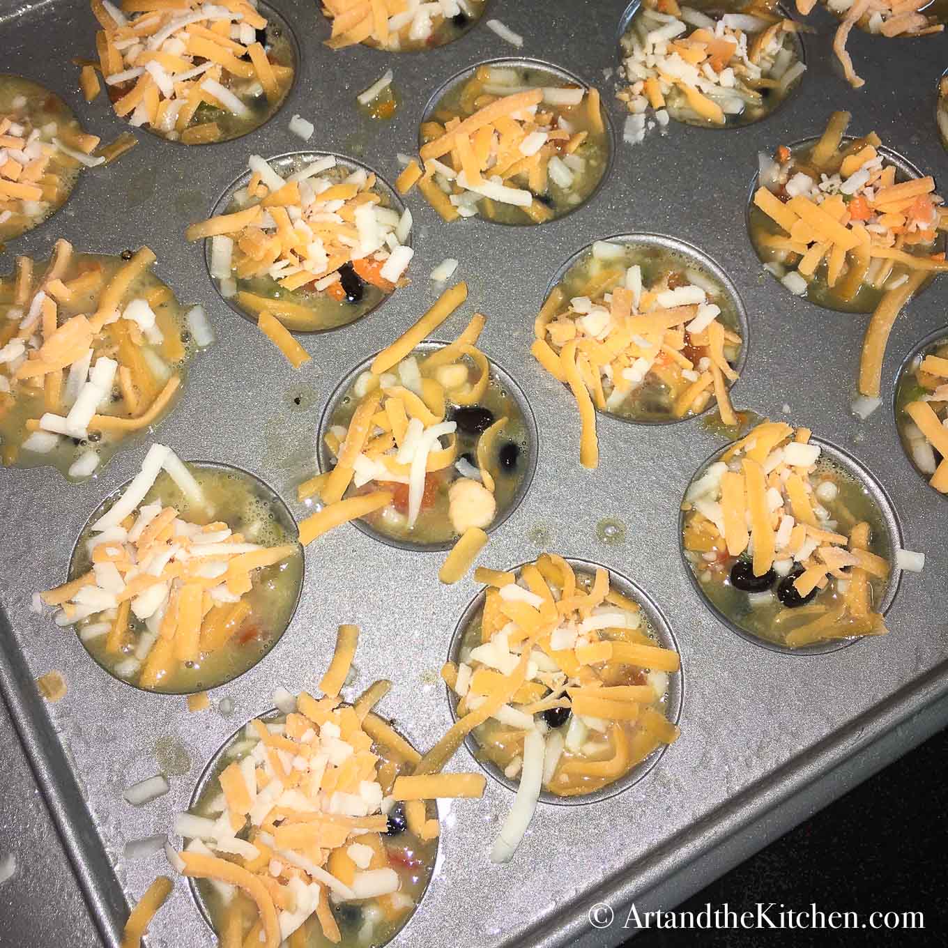 Top Black Bean Frittata Bites with cheese