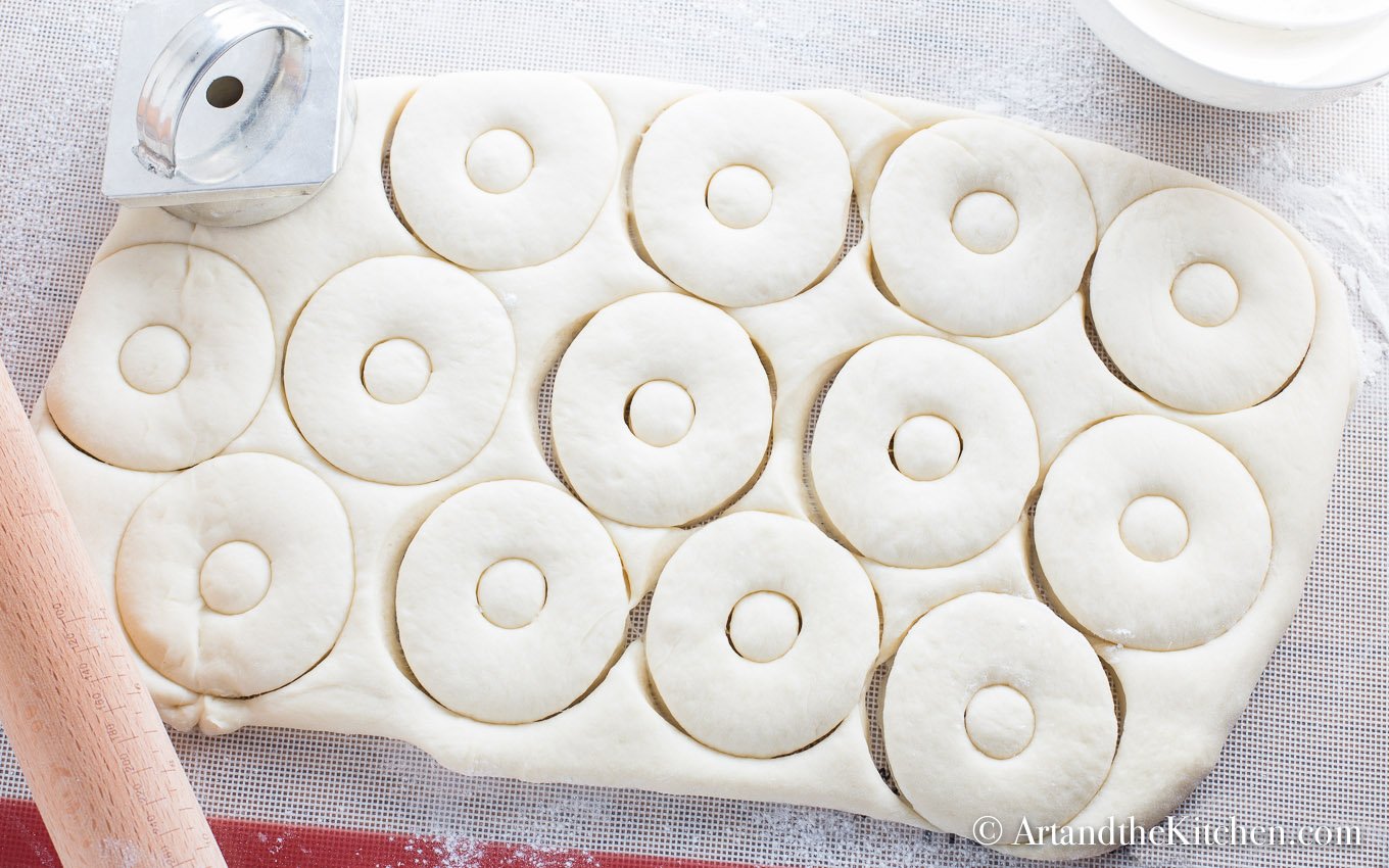 Dough cut into donut shapes.