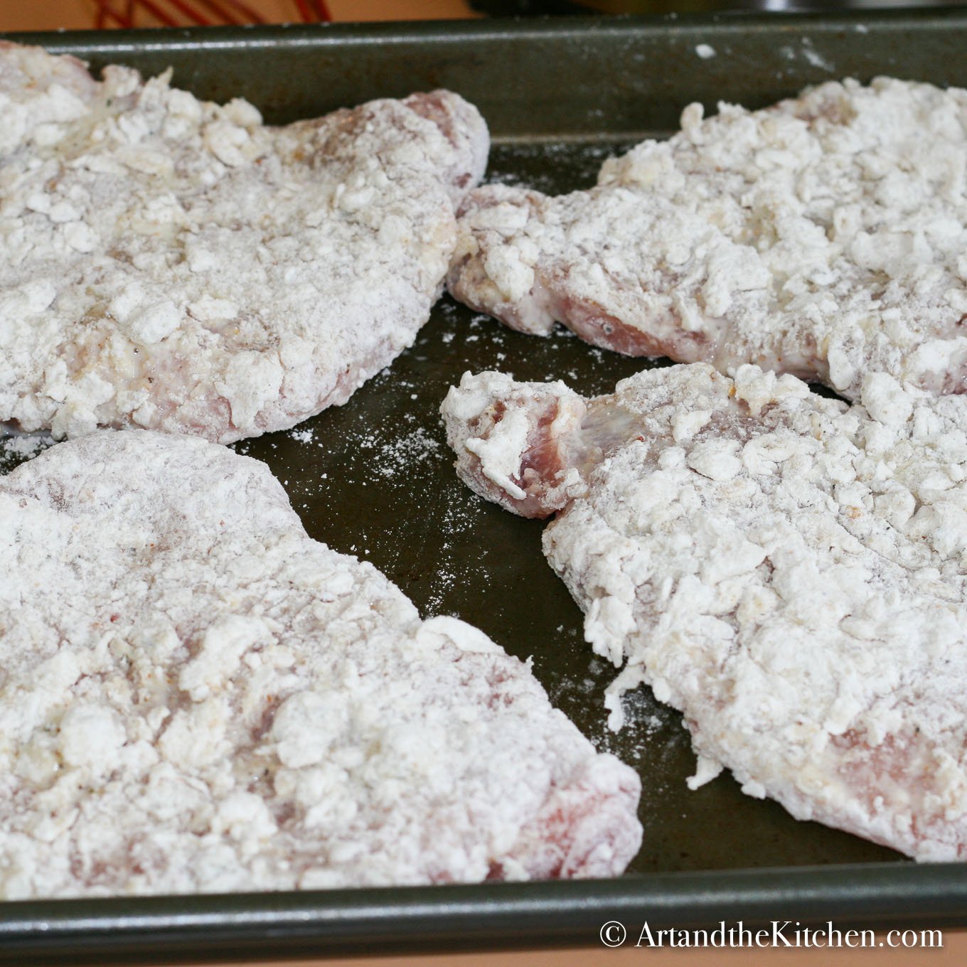 Pork cutlets that are dredged in flour, then beaten egg milk mix followed by bread crumbs.