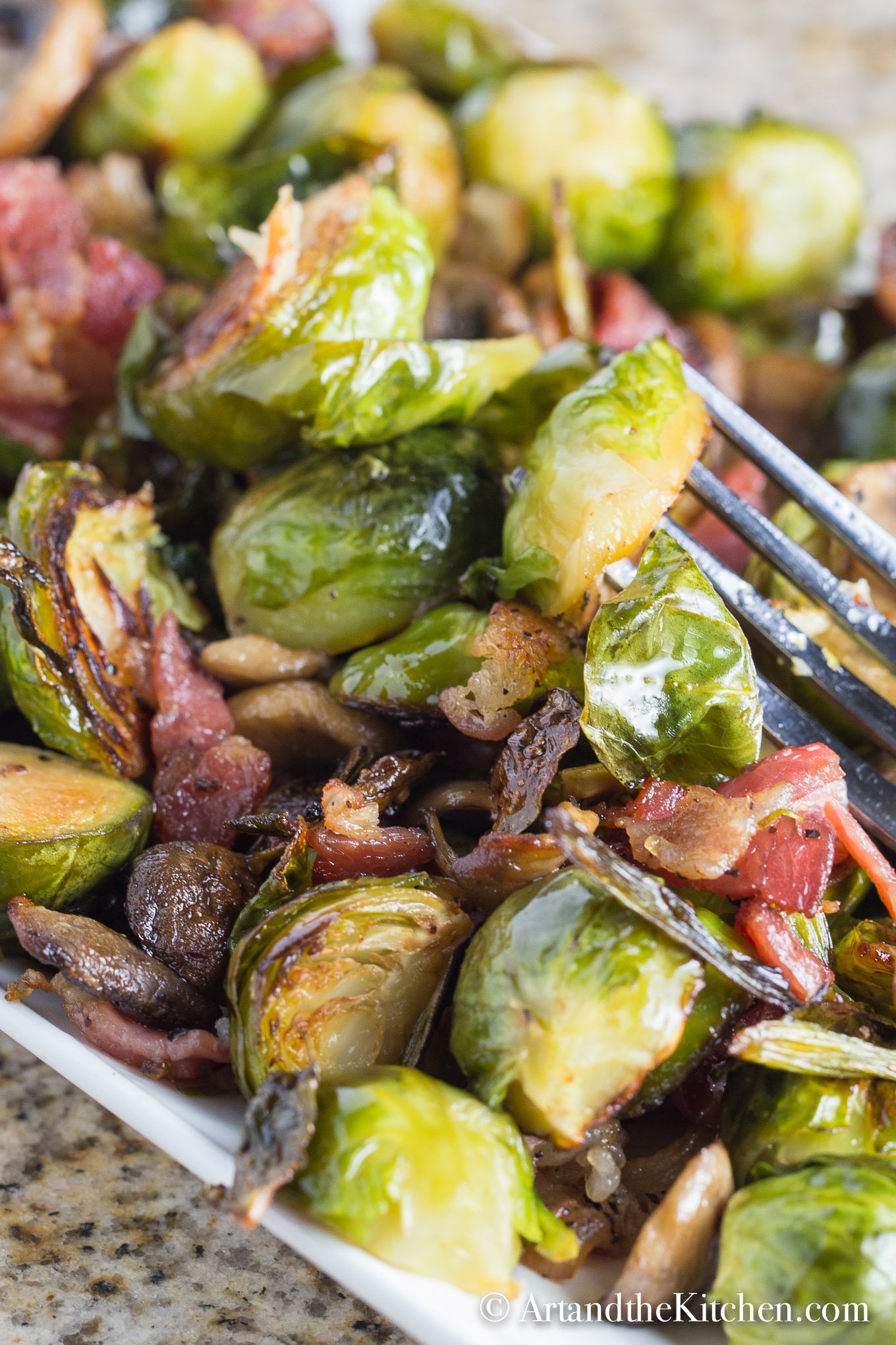 Roasted brussels sprouts with bacon and mushrooms.