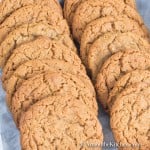 Box filled with rows of molasses cookies.