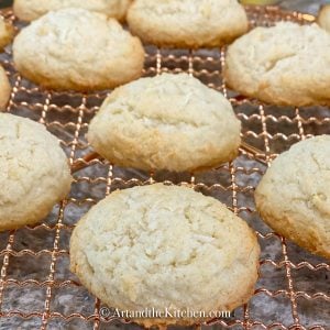 Copper baking rack filled with coconut sugar cookies.