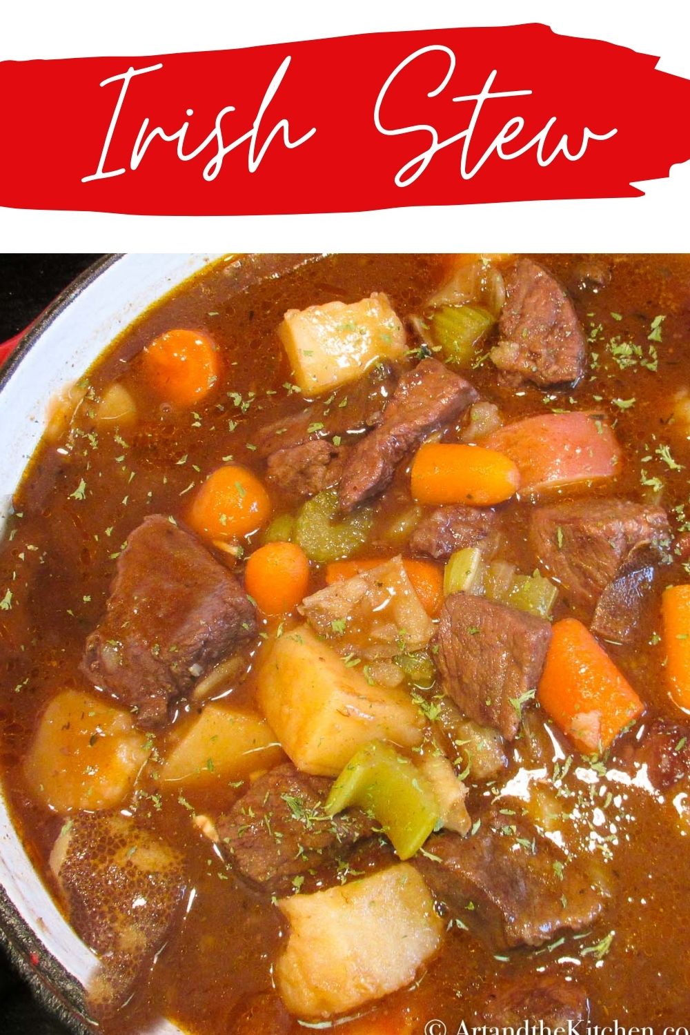 This Irish Stew recipe is one of my best stew recipes! This savory stew is flavored with Guinness beer and red wine! A perfect dinner recipe for St. Patrick's Day. A saucy stew of beef and vegetables in a cast-iron pot via @artandthekitch