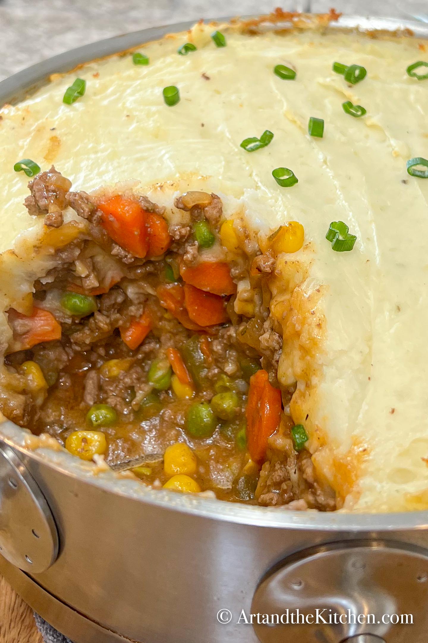 Shepherd's pie in stainless steel skillet.