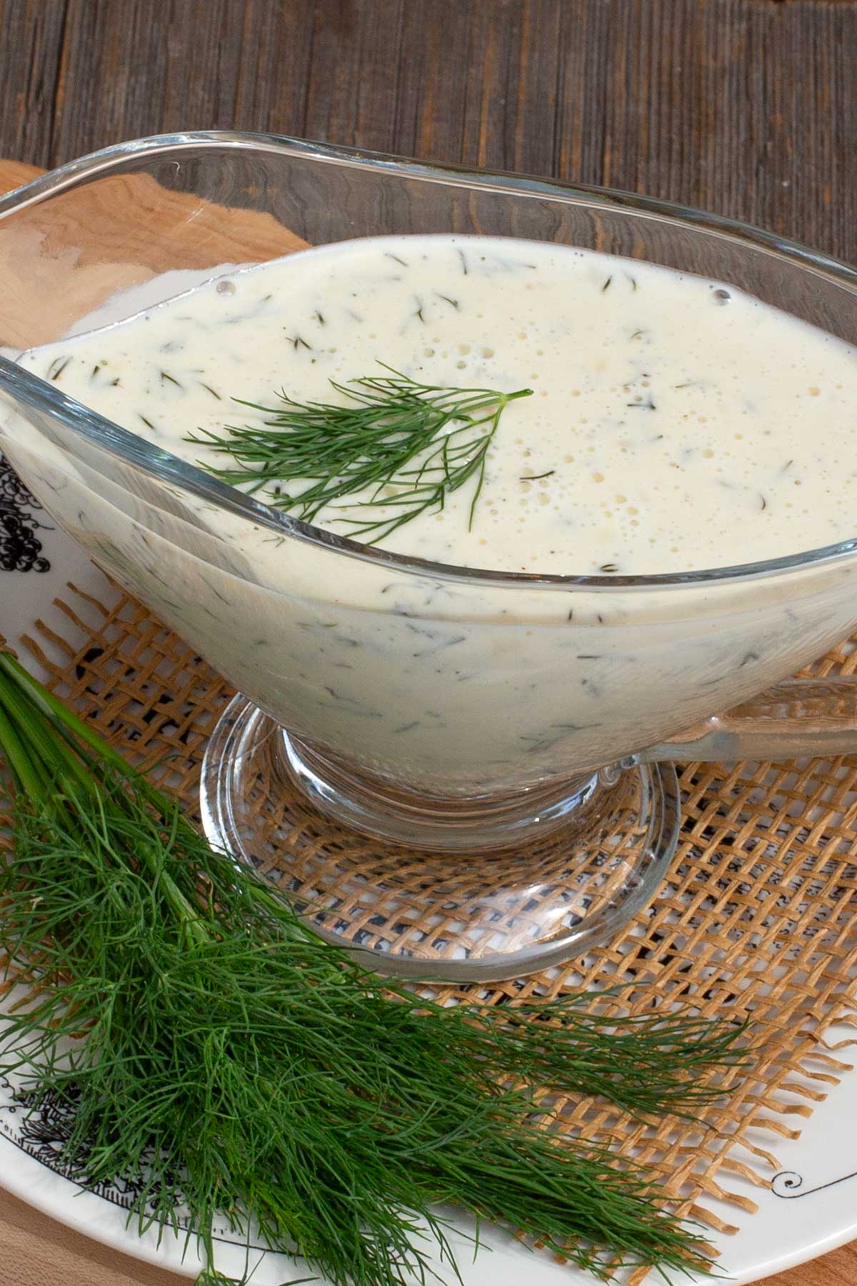 Creamy dill sauce in a glass serving dish.