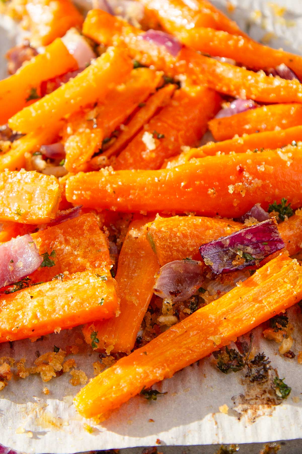 Pan roasted carrots with red onions, parsley and breadcrumbs.