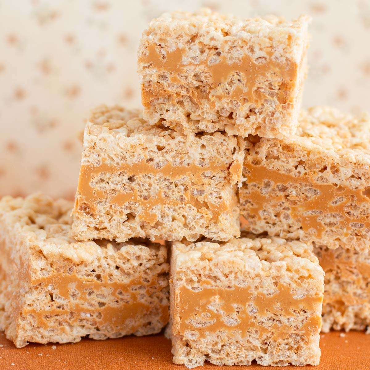 Stack of Rice Krispie squares with a butterscotch center.