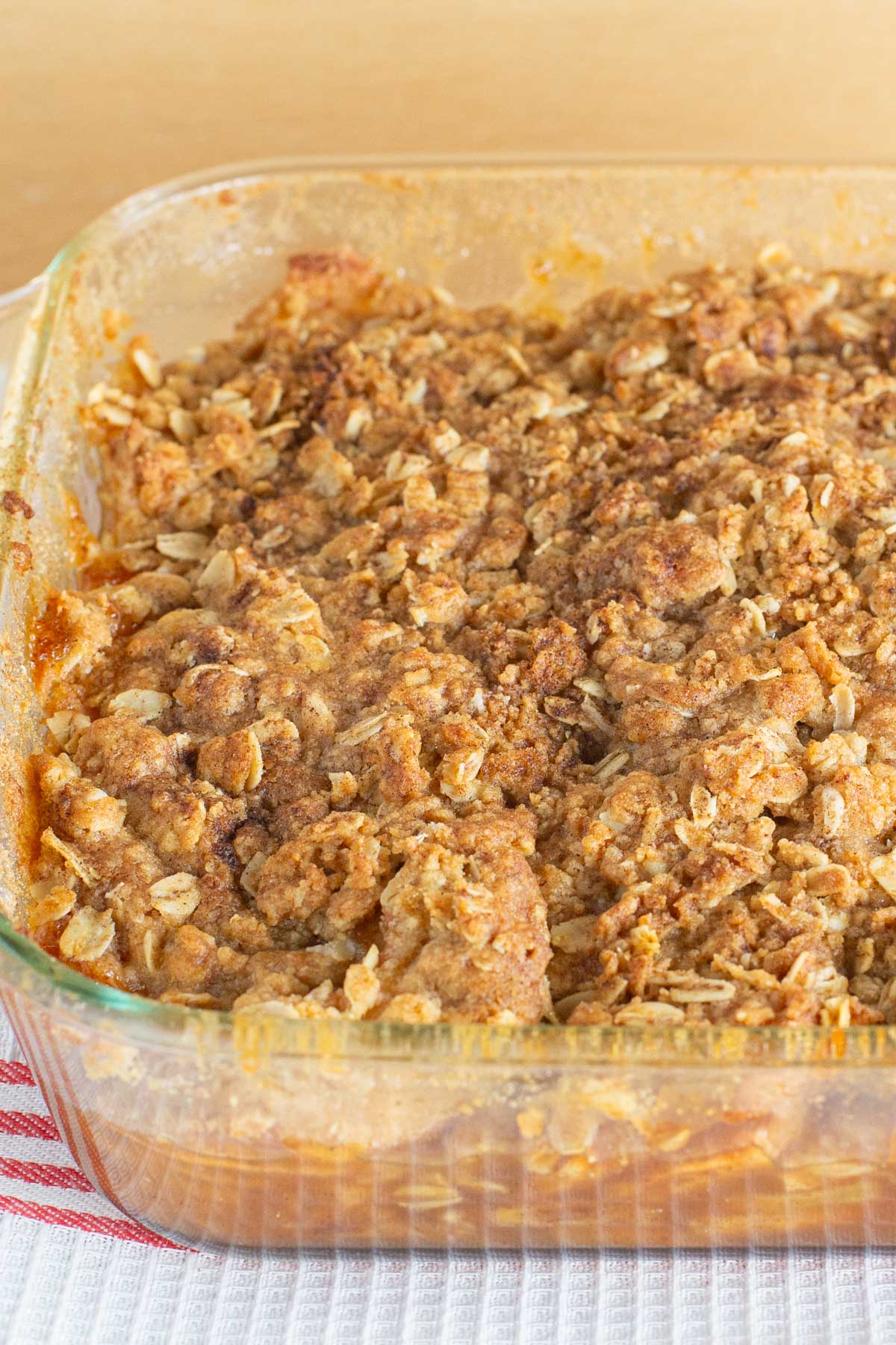 Apple crisp baked in glass baking pan.