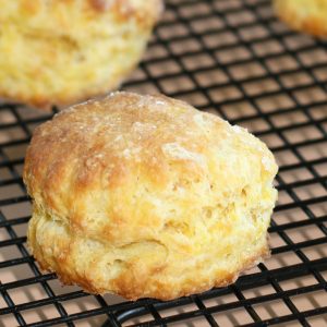 Squash scones on a black cooling rack.