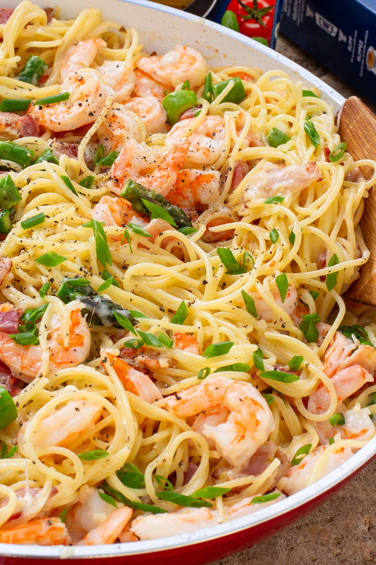 Skillet of spaghetti, shrimp and asparagus.