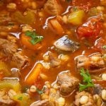 Soup pot of beef, vegetable and barley soup.