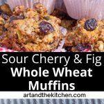 Hearty muffins with dried cherries, nuts, and seeds in paper liners fill a red gingham cloth lined basket.