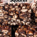Stack of puffed wheat squares on a white decorative plate.