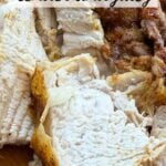 Close-up of sliced, golden-brown chicken breasts on a wooden board. Text overlay reads "Air Fryer Chicken Breasts tender and juicy" at the top.